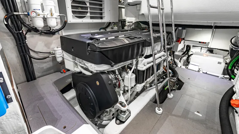 Slide: The Image of Engine room of 2025 Absolute Navetta 64 yacht, showcasing modern machinery and equipment. - 52