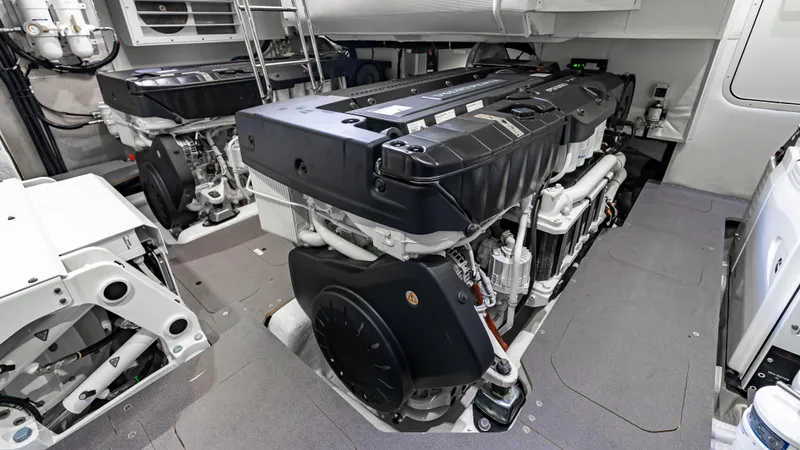 Slide: The Image of Engine room of 2025 Absolute Navetta 64 yacht, showcasing advanced machinery and design. - 54