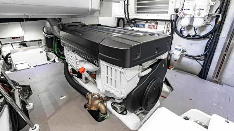 Slide: The Image of Engine room of 2025 Absolute Navetta 64 yacht, showcasing modern machinery and components. - 55