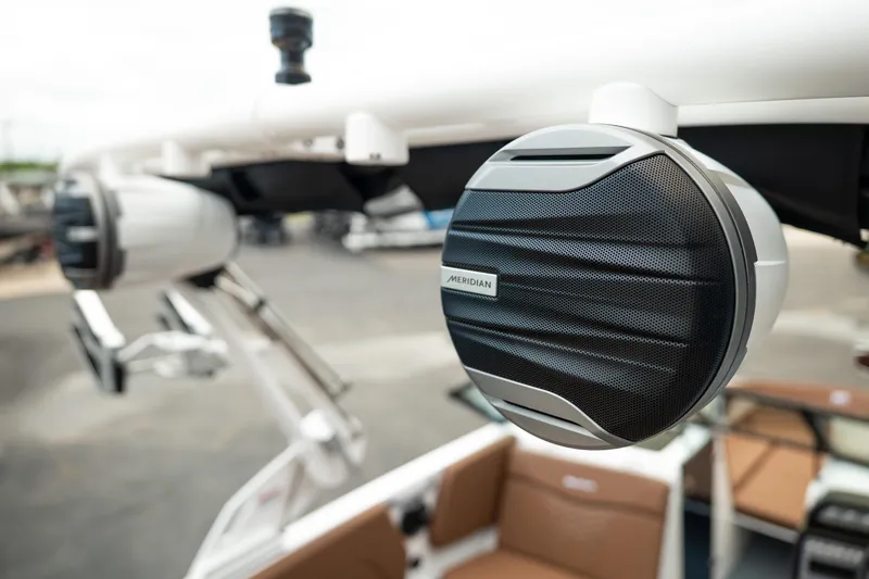Slide: The Image of Close-up of Meridian speaker on 2026 MasterCraft NXT23 boat, showcasing premium audio features. - 14