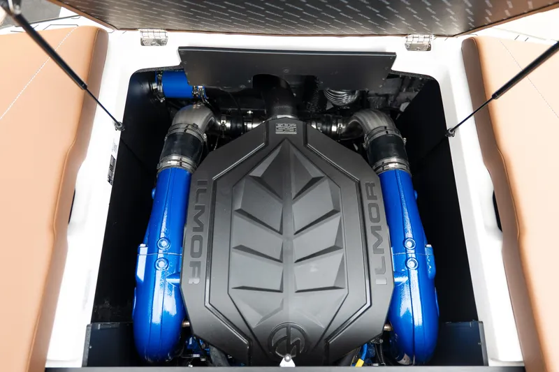 Slide: The Image of 2026 MasterCraft NXT23 engine compartment with Ilmor engine and blue components. - 15