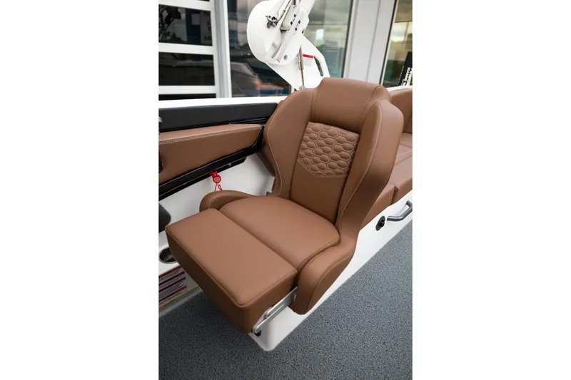 Slide: The Image of Luxurious brown seat in 2026 MasterCraft NXT23 boat, featuring elegant stitching and modern design. - 20