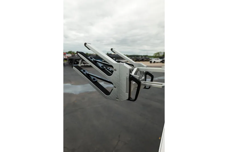 Slide: The Image of 2026 MasterCraft NXT23 wakeboard rack on a cloudy day. - 29