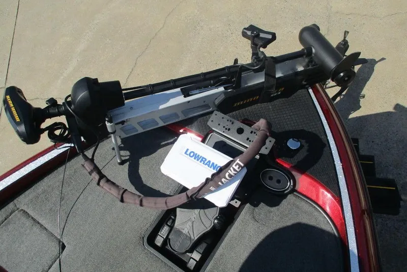 Slide: The Image of 2014 Triton 18XS SC boat with trolling motor and Lowrance equipment on deck. - 3