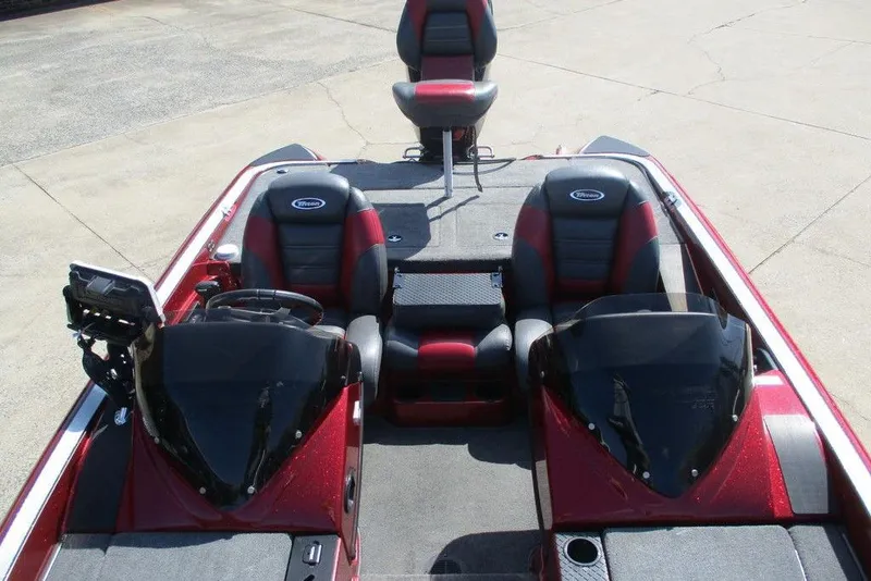 Slide: The Image of 2014 Triton 18XS SC boat interior with dual seats and steering console. - 7