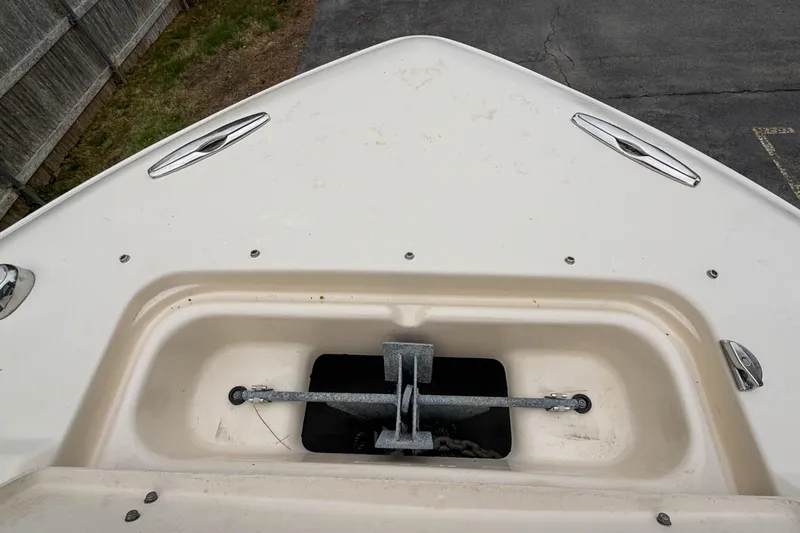 Slide: The Image of Bow view of 2015 Grady-White Freedom 275 boat with anchor compartment. - 31