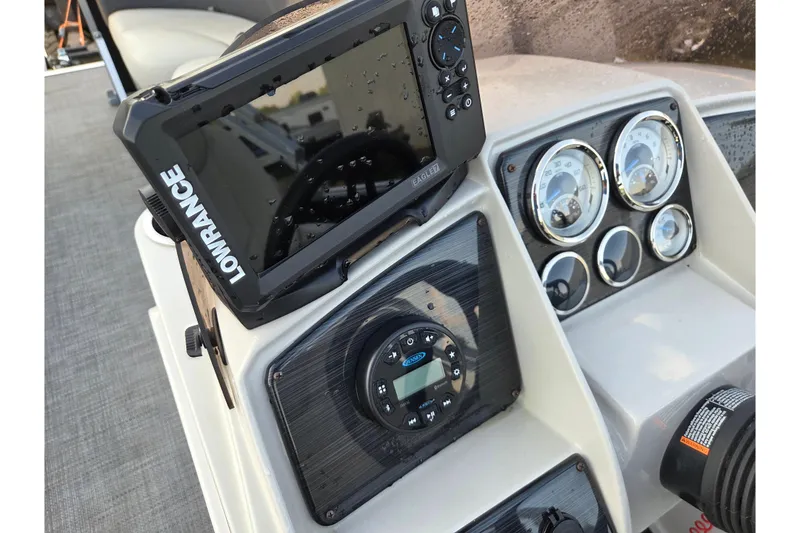 Slide: The Image of Dashboard of 2022 Sylvan Mirage 820 Cruise with Lowrance fishfinder and gauges. - 8
