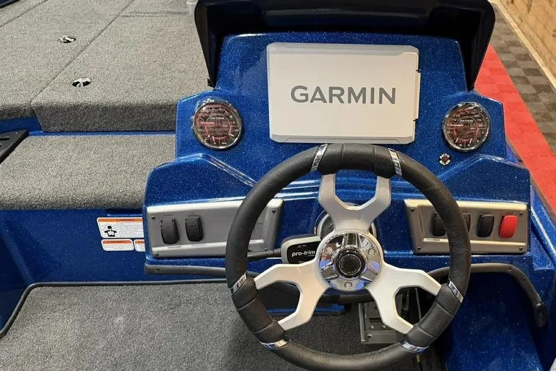 Slide: The Image of Steering console of 2026 Nitro Z18 Pro boat with Garmin display and controls. - 13