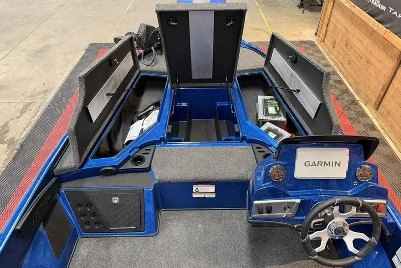 Slide: The Image of 2026 Nitro Z18 Pro boat interior with Garmin electronics and ample storage compartments. - 5