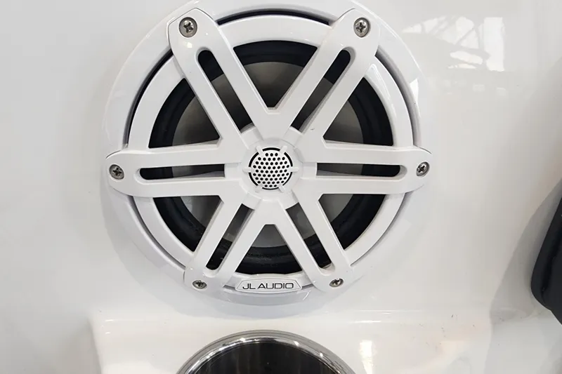 Slide: The Image of White JL Audio speaker on 2026 Stingray 211 DC boat. - 41