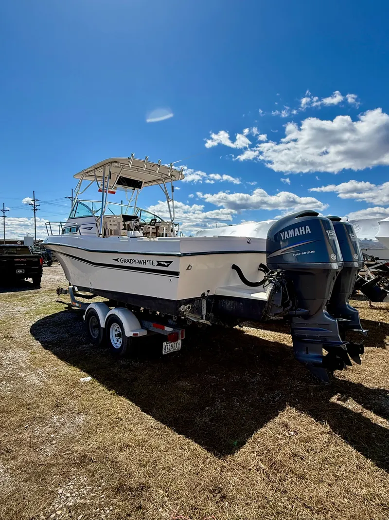 Slide: The Image of 1996 Grady-White Gulfstream 232 boat with Yamaha engine on trailer. - 8