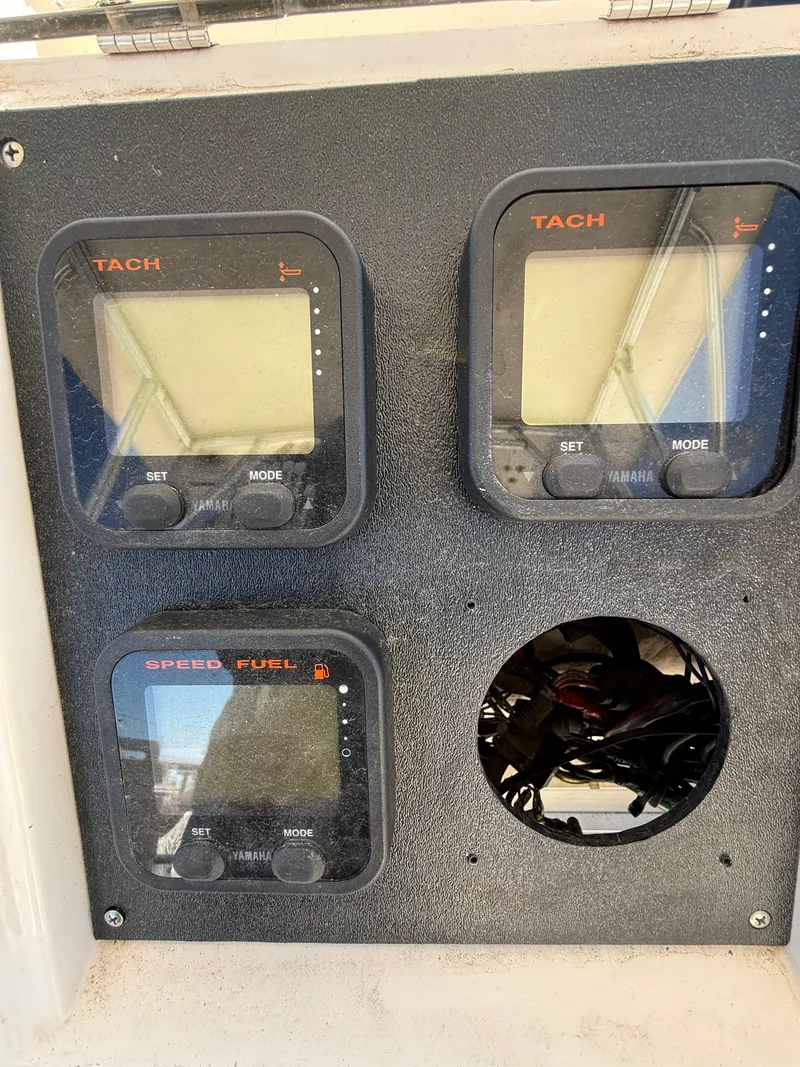 Slide: The Image of Dashboard of a 1996 Grady-White Gulfstream 232 boat. - 9