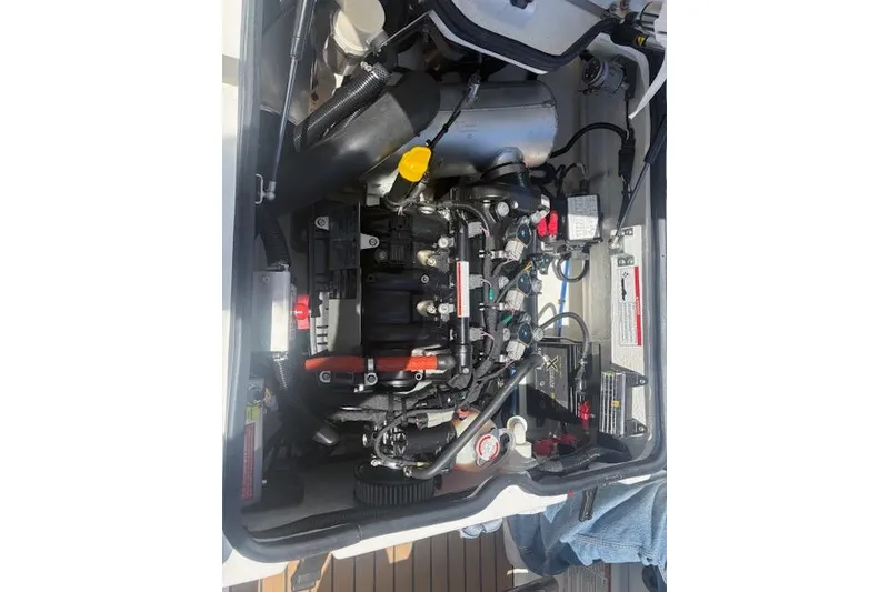 Slide: The Image of Engine compartment of 2024 Williams Jet Tenders Sportjet 345, showcasing intricate mechanical components. - 5