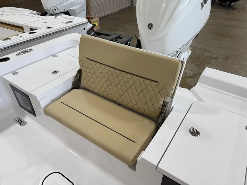 Slide: The Image of Sportsman Masters 227 Bay Boat 2026 with beige seat upholstery. - 11