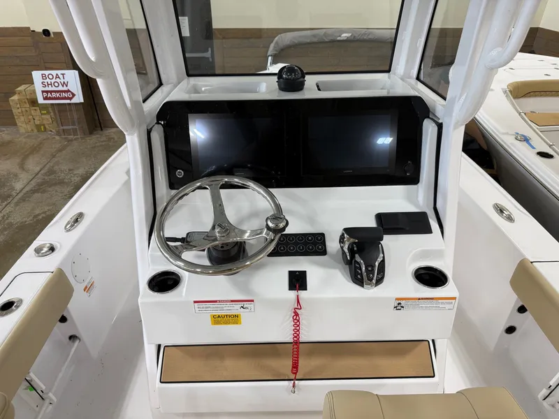 Slide: The Image of Helm console of the 2026 Sportsman Masters 227 Bay Boat. - 12