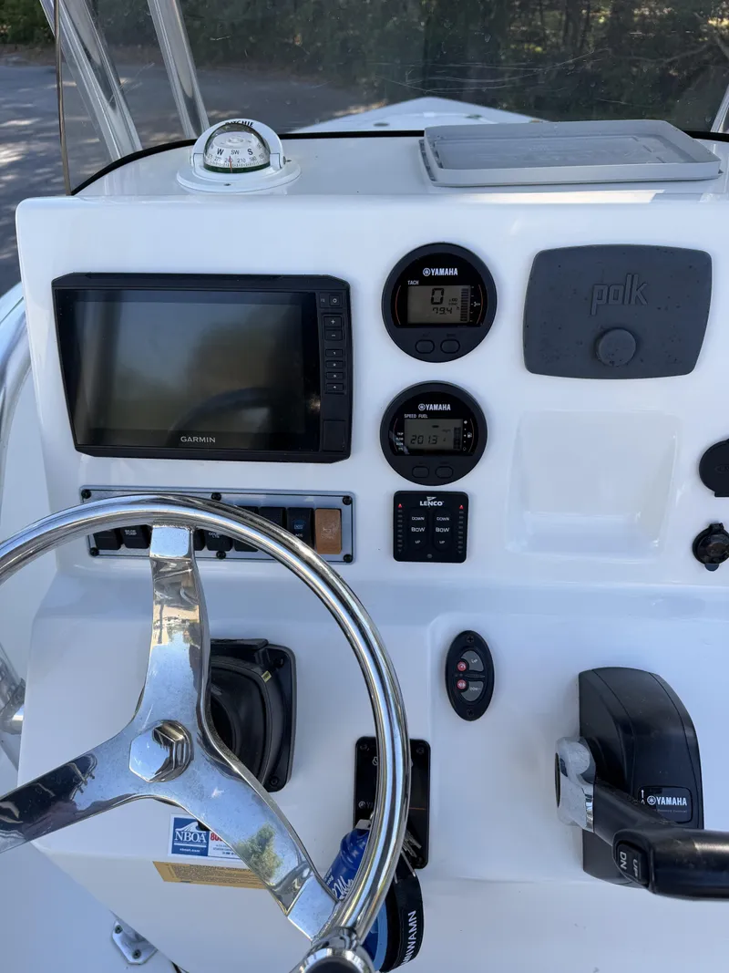Slide: The Image of Dashboard of a 2019 Key West 189 FS boat with Garmin display. - 11