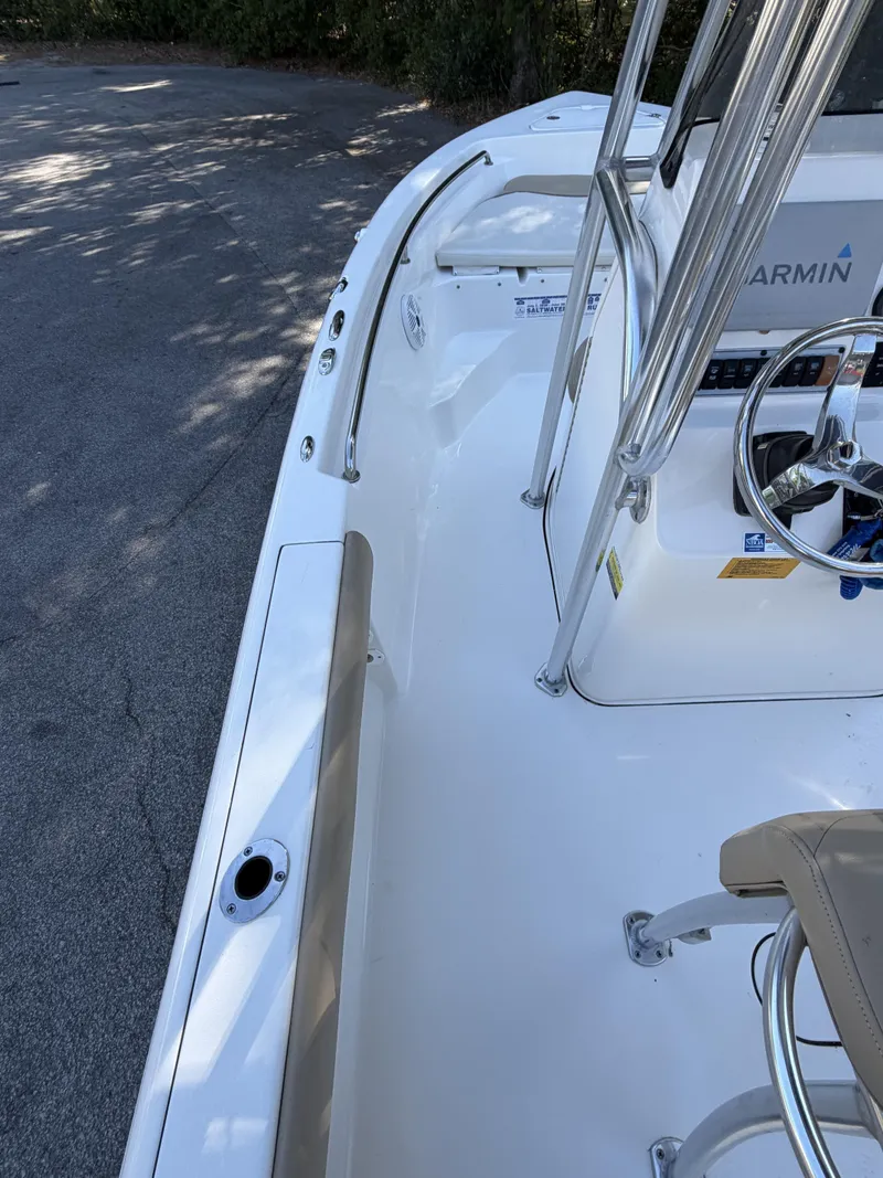 Slide: The Image of Interior view of a 2019 Key West 189 FS boat with helm console. - 13