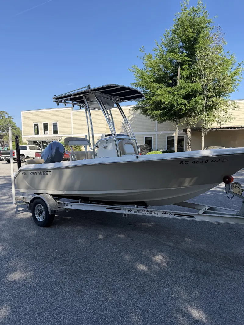 Slide: The Image of 2019 Key West 189 FS boat parked on trailer outdoors. - 3