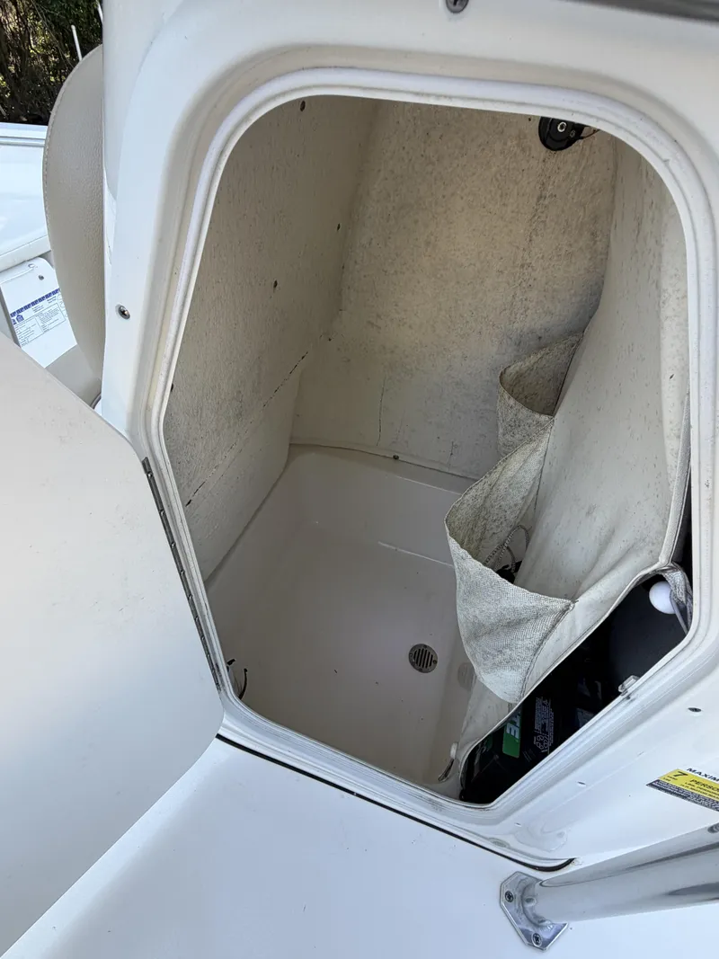 Slide: The Image of Interior of a 2019 Key West 189 FS boat, storage or cabin area. - 8