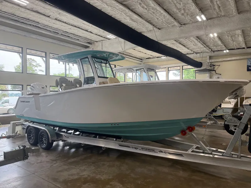 The Image of 2026 Sportsman Heritage 261 Center Console in showroom. - 1