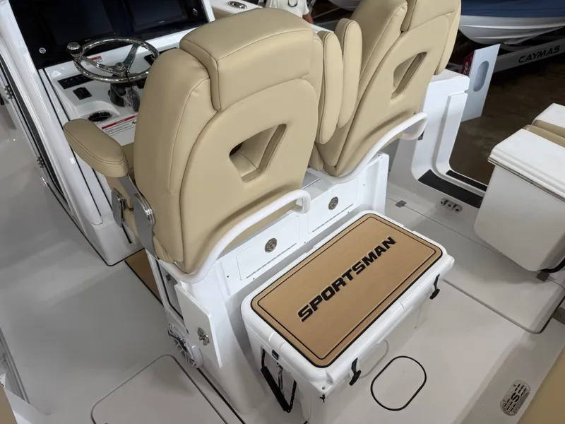 Slide: The Image of Interior of Sportsman Heritage 261 Center Console 2026 with beige seats. - 12