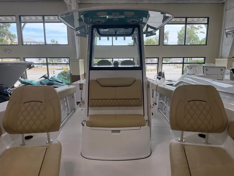 Slide: The Image of Interior view of the 2026 Sportsman Heritage 261 Center Console boat. - 18