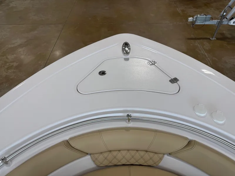Slide: The Image of Sportsman Heritage 261 Center Console 2026, bow view with seating area. - 8
