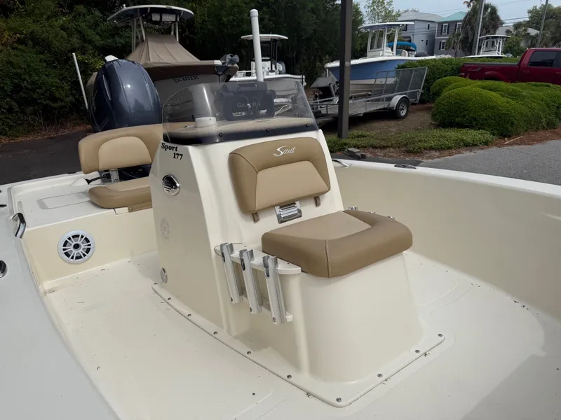 Slide: The Image of Scout 177 Sport 2021 boat with beige seat and helm console. - 9