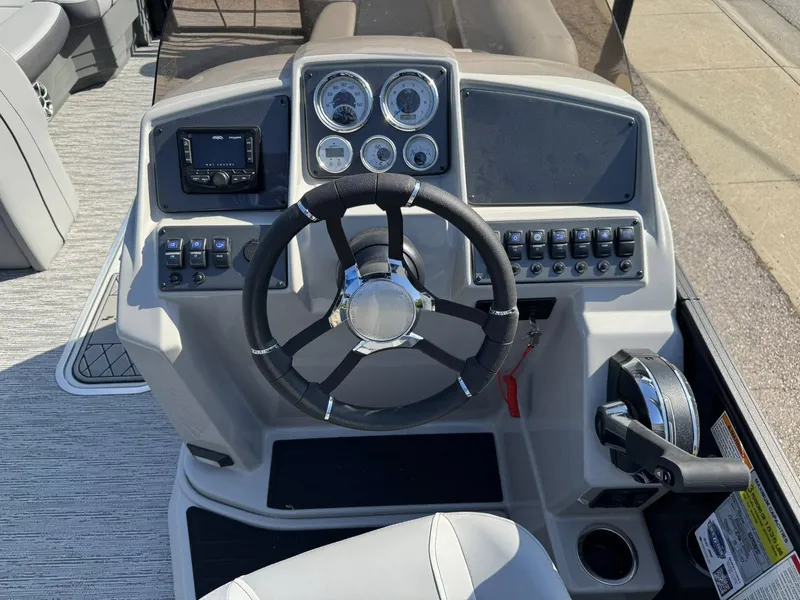 Slide: The Image of Control console of the 2026 Starcraft EXS 5 R DH boat. - 10