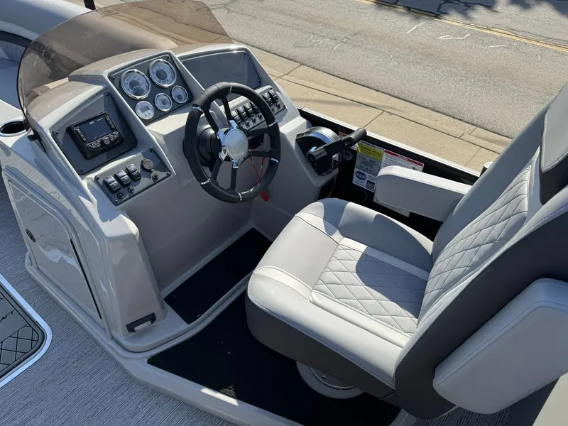 Slide: The Image of Cockpit of Starcraft EXS 5 R DH boat, model year 2026. - 8