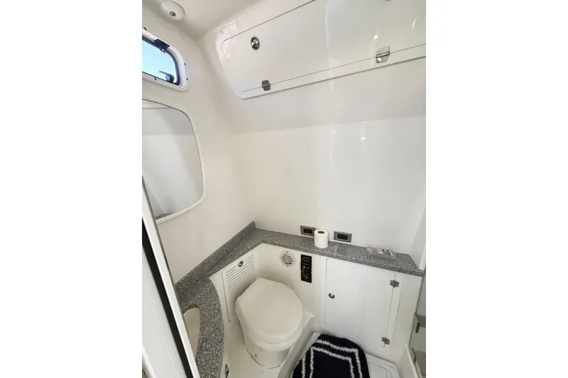 Slide: The Image of 2019 HCB 53 Suenos boat bathroom with modern fixtures and compact design. - 14