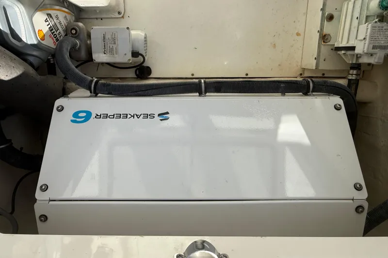Slide: The Image of Engine compartment of a 2019 HCB 53 Suenos featuring a Seakeeper 6 stabilizer. - 39