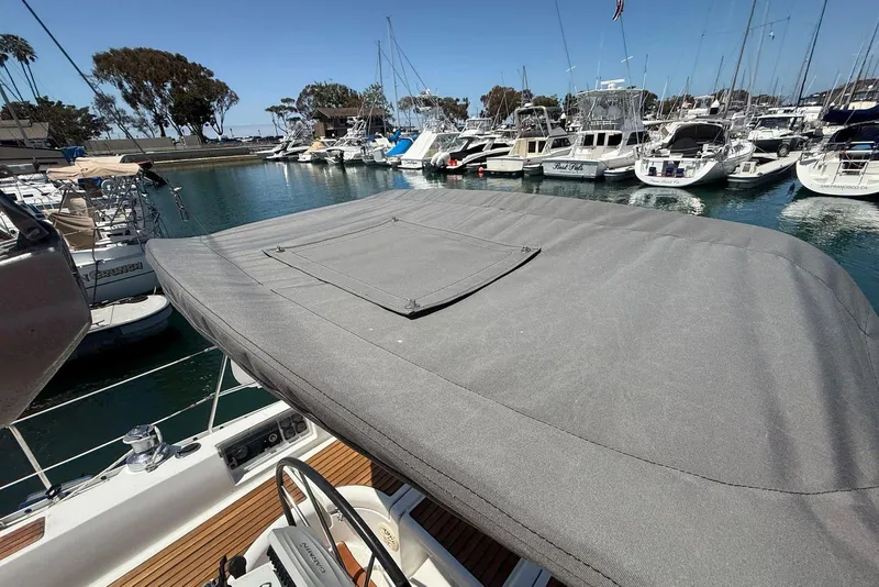 Slide: The Image of 2001 Beneteau Oceanis 361 sailboat cockpit with canopy and rigging, docked at marina. - 12