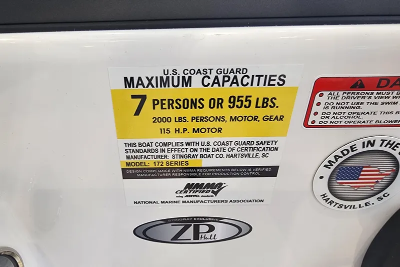 Slide: The Image of 2026 Stingray 172 DC boat capacity label, 7 persons or 955 lbs, 115 HP motor. - 21
