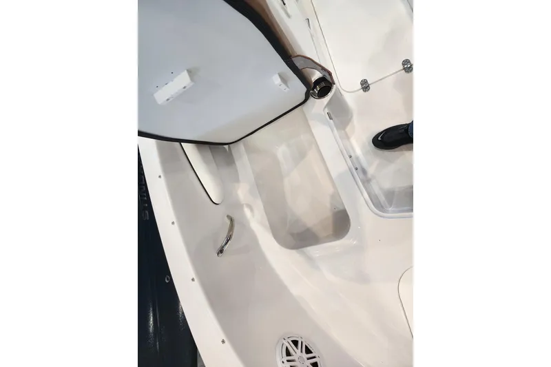 Slide: The Image of Interior view of 2026 Stingray 172 DC boat, showcasing seating and storage area. - 28