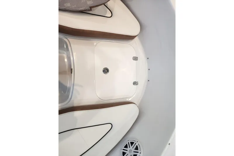 Slide: The Image of Interior view of 2026 Stingray 172 DC boat, featuring seating and storage compartment. - 30