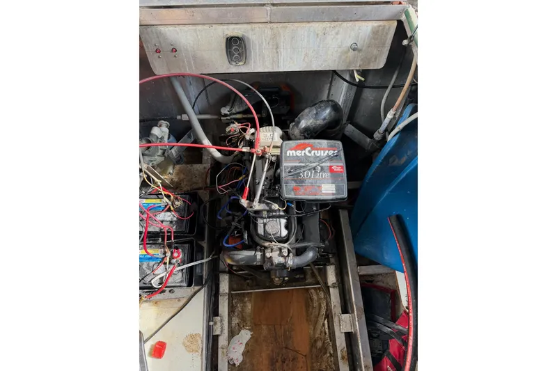 Slide: The Image of Engine compartment of a 1989 Sumerset 14x63 houseboat with MerCruiser 3.0L engine. - 39