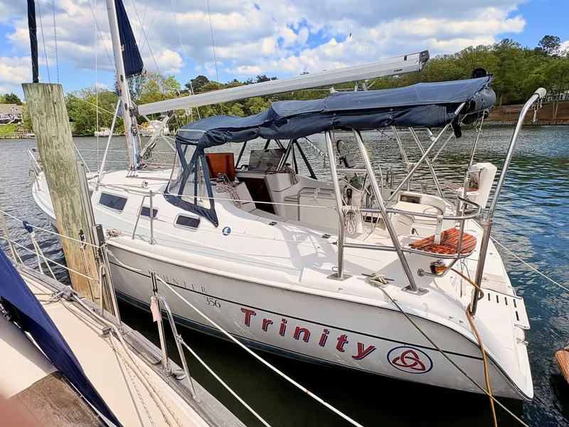 The Image of 2003 Hunter 356 sailboat "Trinity" docked at marina. - 0