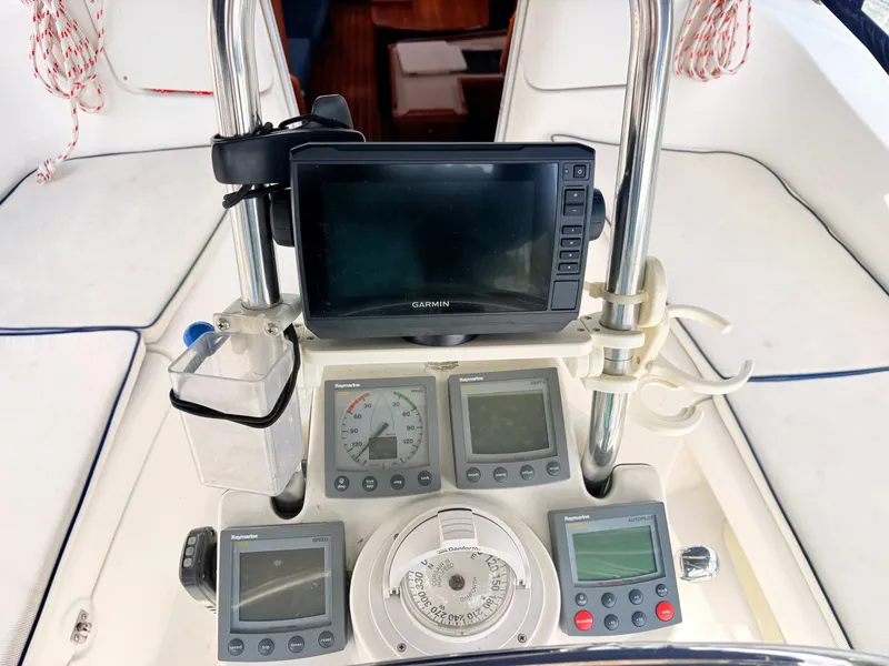 Slide: The Image of 2003 Hunter 356 yacht helm with Garmin navigation system. - 12