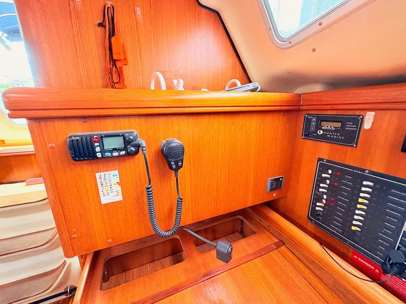 Slide: The Image of Interior of a 2003 Hunter 356 sailboat with communication equipment. - 27