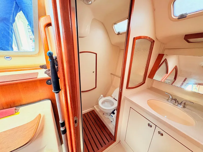Slide: The Image of Interior view of 2003 Hunter 356 yacht bathroom. - 33