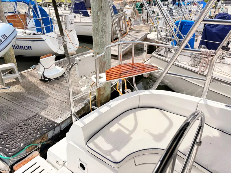Slide: The Image of 2003 Hunter 356 sailboat docked at marina. - 9