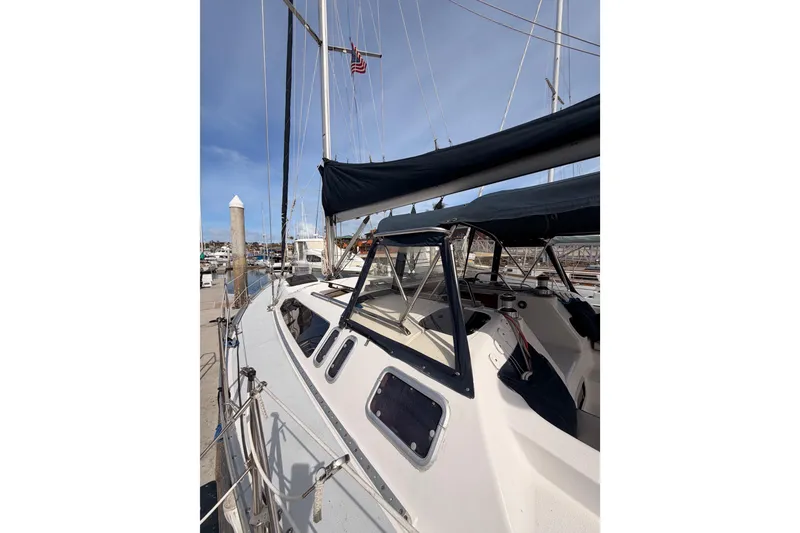 Slide: The Image of Sailboat docked at marina, 1998 Hunter Legend 40.5, clear sky background. - 10