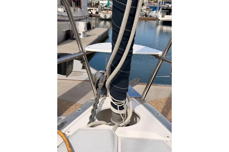 Slide: The Image of Bow of 1998 Hunter Legend 40.5 sailboat with ropes and anchor chain. - 15