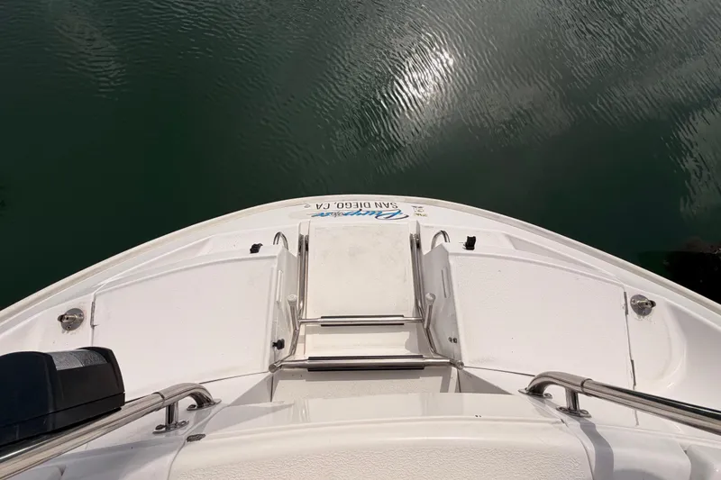 Slide: The Image of Bow view of 1998 Hunter Legend 40.5 sailboat on calm water. - 22