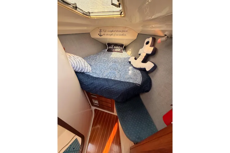 Slide: The Image of Cozy cabin interior of 1998 Hunter Legend 40.5 sailboat with nautical decor. - 56