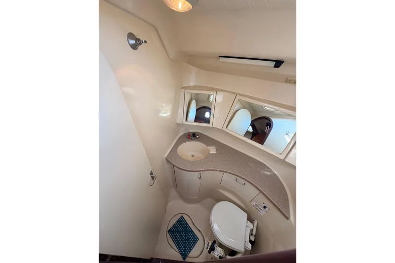 Slide: The Image of Bathroom interior of 1998 Hunter Legend 40.5 yacht with sink and toilet. - 58