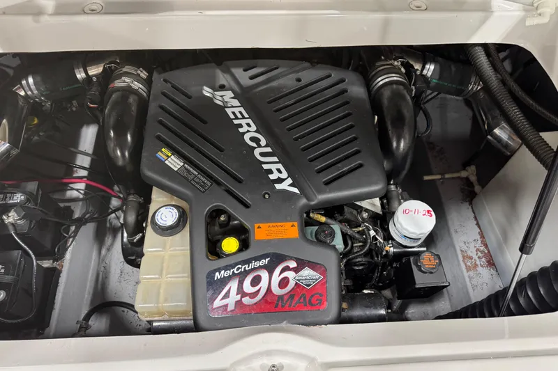 Slide: The Image of 2003 Crownline 270 BR boat engine, featuring a MerCruiser 496 MAG. - 12