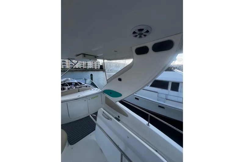 Slide: The Image of 2001 Maxum 4600 SCB Limited Edition yacht interior with marina view. - 12