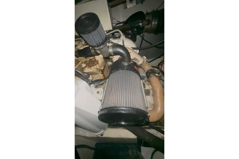 Slide: The Image of Engine compartment of a 2001 Maxum 4600 SCB Limited Edition with visible air filters. - 23